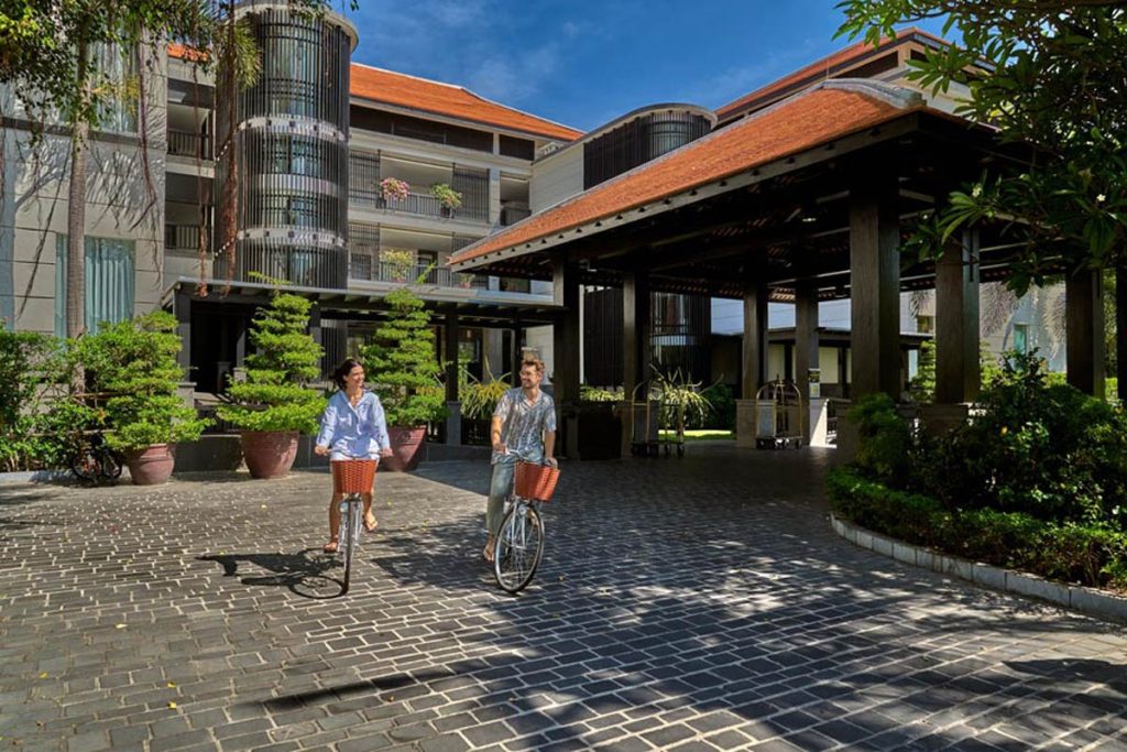 Walking through the resort courtyard at Anantara Mui Ne